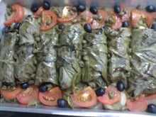 Sardinhas assadas em folhas de couve