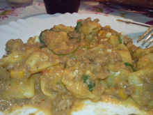 Capeletti ao molho de carne e rúcula