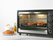 Está em busca de um forno elétrico? Este modelo tem grande capacidade, porta com duas camadas de vidro e até termostato