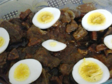 Lingua ao molho de madeira