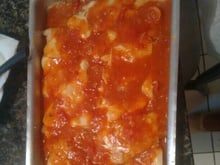 Filé à parmegiana de merluza