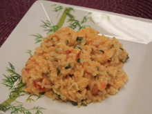 Risoto de frango defumado com tomate seco e rúcula
