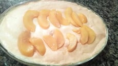 Torta de pêssego em caldas