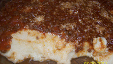 Polenta cremosa à bolonhesa