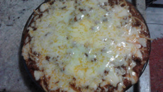 Espaguete à bolonhesa gratinado com queijo