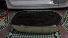 Torta de biscoito com maracujá e cobertura de chocolate