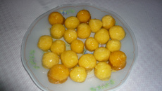 Bala de coco caramelizada