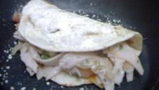 Panqueca de blanquet de peru e queijo cheddar