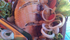 Pacu recheado com carne de piranha