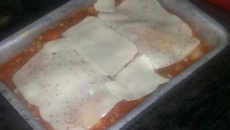 Filé de tilápia à parmegiana