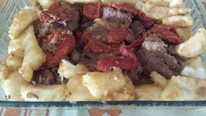 Costela suína com tomate seco na pressão e aipim