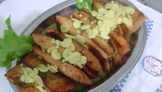 Filé de salmão ao molho de mostarda e champignon