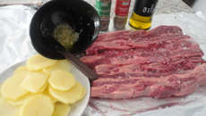 Costela ao bafo com alho e batatas