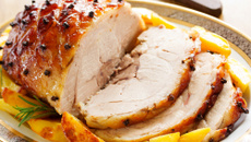 Lombo assado ao molho de laranja