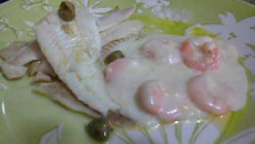 Filé de peixe na manteiga com alcaparras