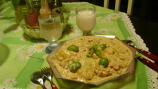 Galinha no molho de tomate com pequi