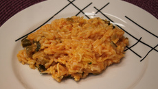 Risoto com tomate seco, mussarela e rúcula da Tam