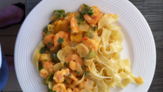 Camarão flambado ao molho de coco