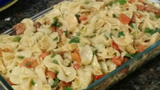 Macarrão com tomate e rúcula