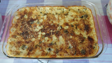 Concha de batata rostie com bacalhau gratinado