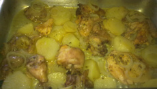 Frango assado com batatas ao molho de laranja