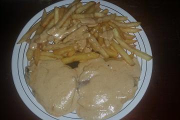 Bife do lombinho com molho de cogumelos