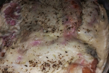 Filé de frango à parmegiana no molho branco