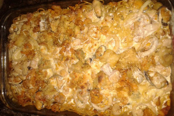 Espaguete com frutos do mar gratinado