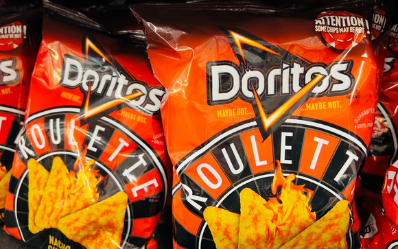 Você arriscaria a sorte em uma roleta de Doritos picantes? (Créditos: Shutterstock/ZikG)