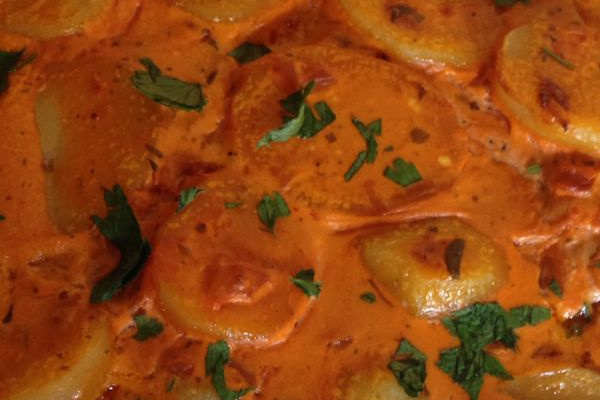 Filé de peixe ao molho de leite de coco e creme de leite