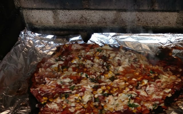 Peixe assado na grelha