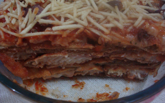 Filé de merluza e berinjela empanados à parmegiana