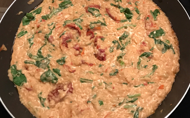 Risoto de tomate seco com rúcula