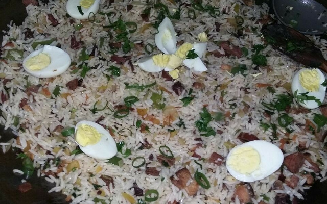 Arroz carreteiro no disco de arado