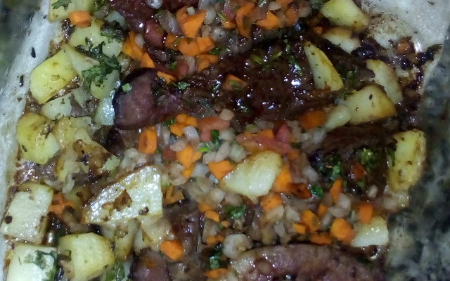 Coração assado com batatas grelhadas