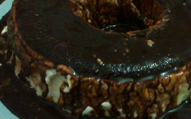 Sorvete de creme com cobertura de chocolate