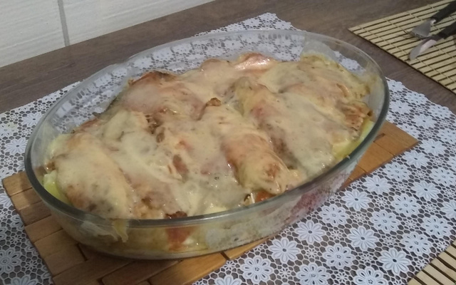 Filé de tilápia com batatas e requeijão ao forno