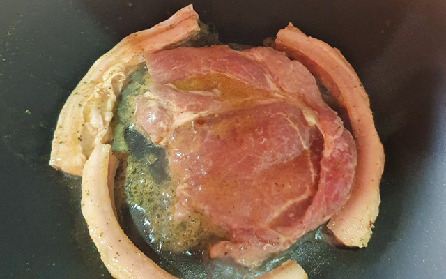 Bisteca de porco feita no taxo