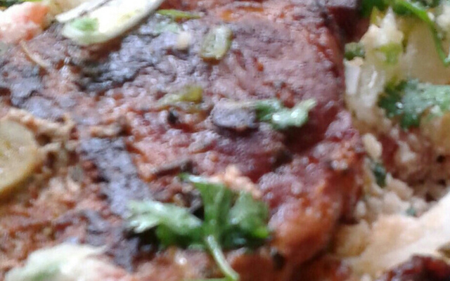 Bisteca de porco assada