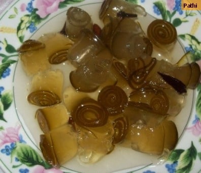 Doce de mamão enroladinho