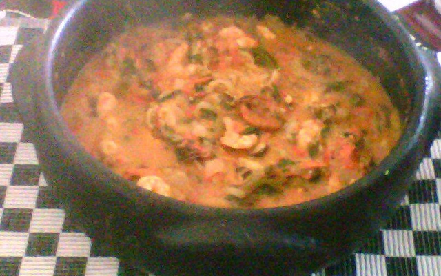 Moqueca de Sururu com farofa de alho