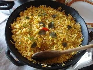 Arroz mãe e filha cozinhando