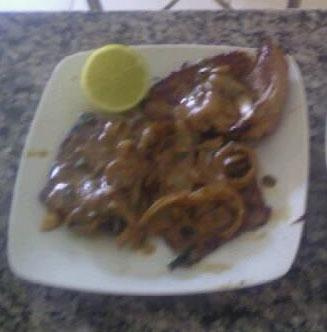 Bisteca de porco feita no taxo