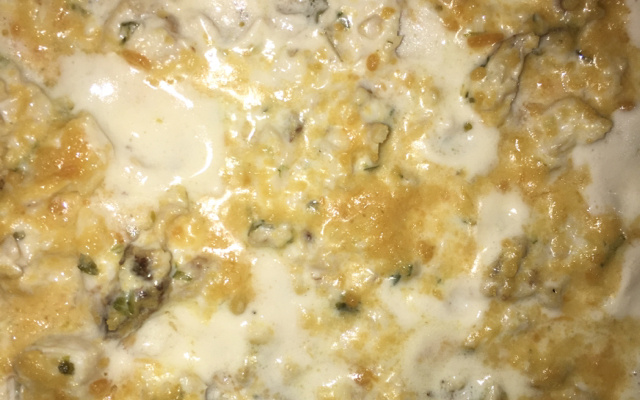 Filé de peixe ao molho branco com coentro