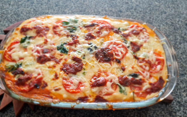 Filé de tilápia com batatas e requeijão ao forno