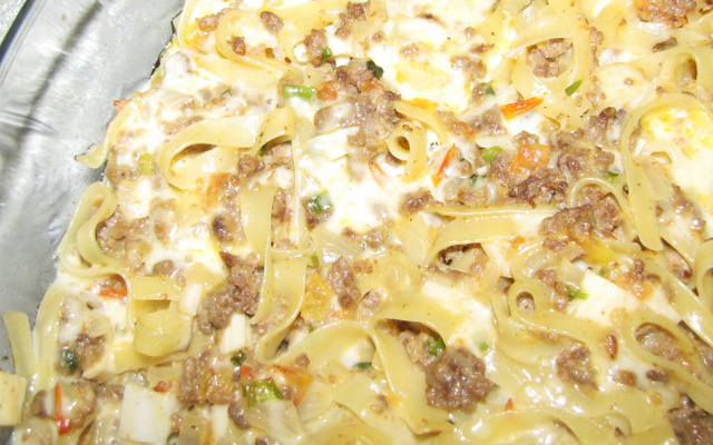 Macarrão ao molho bolonhesa com palmito