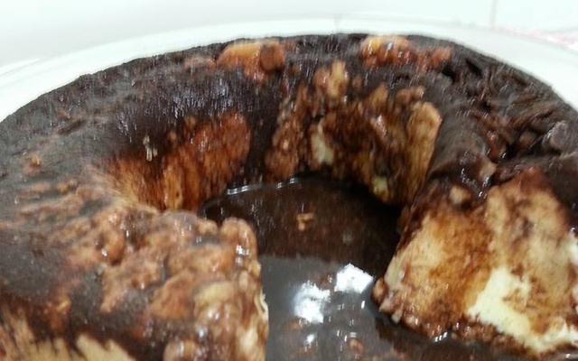 Sorvete de creme com cobertura de chocolate