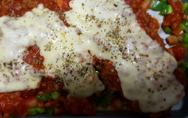 Bife de frango à parmegiana