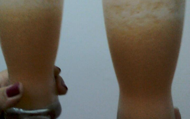 Suco de laranja com leite em pó