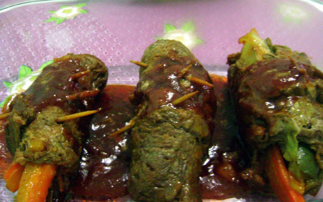 Bife recheado e enrolado